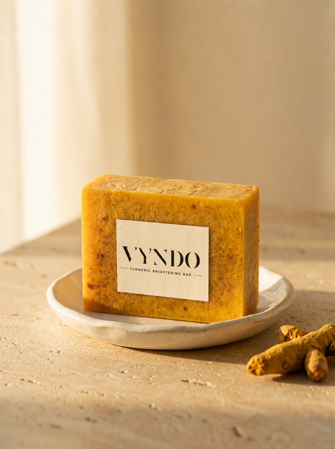 turmeric brightening soap bar on dish for fading dark spots